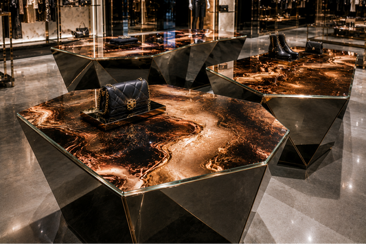Modern interior with geometric tables and reflective floor in a stylish setting