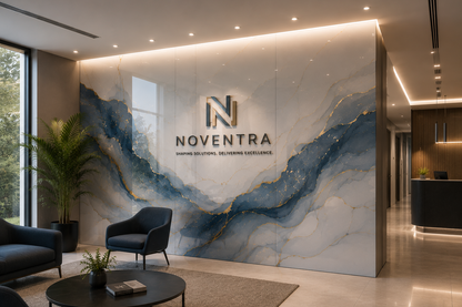 A modern reception lobby with a large marble-style wall featuring blue and gray veining and gold accents, with the NOVENTRA logo and name centered. Dark blue lounge chairs, a round black coffee table, a potted palm, and a reception desk are visible in the interior.